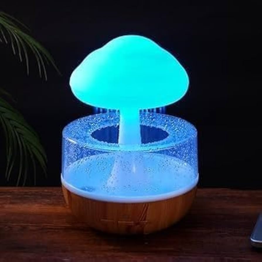 Souqzila cloud rain humidifier with glowing blue mushroom design and wooden base on table