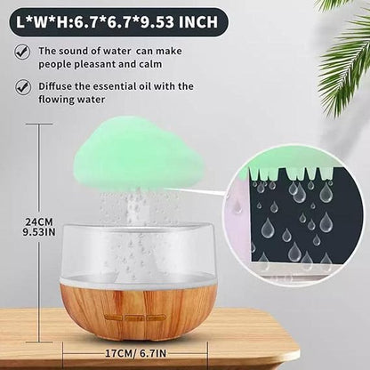 Souqzila cloud rain humidifier with wood base and green cloud top measuring 9.53 inches height