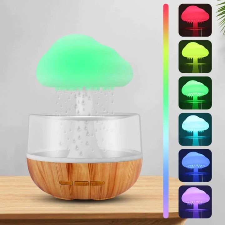 Souqzila cloud rain humidifier with wooden base and LED light color options creating mist in a cloud shape